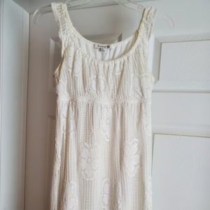 White lace empire waist dress with flutter sleeves